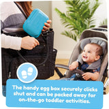 لعبة تطويرية علبة بيض مع كتاكيت ملوّنة من TOMY، لون سماوي